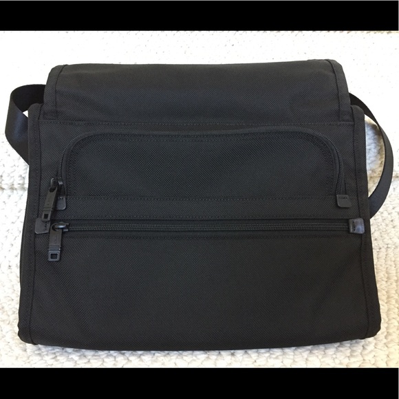 tumi flap zip crossbody